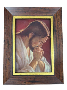 Obraz w ramie z modlącym się Jezusem