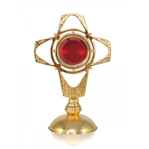 Relikwiarz w kształcie krzyża z dużą kapsułą na relikwie, mosiądz złocony, srebrzony lub patynowany, wysokość 27 cm